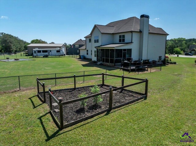 159 Feather Ln, Jackson, GA 30233 - exterior space with a garden, fence, and a sunroom