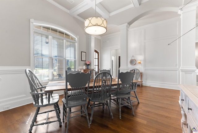 dining room featuring a decorative wall, decorative columns, arched walkways, coffered ceiling, and wood-type flooring