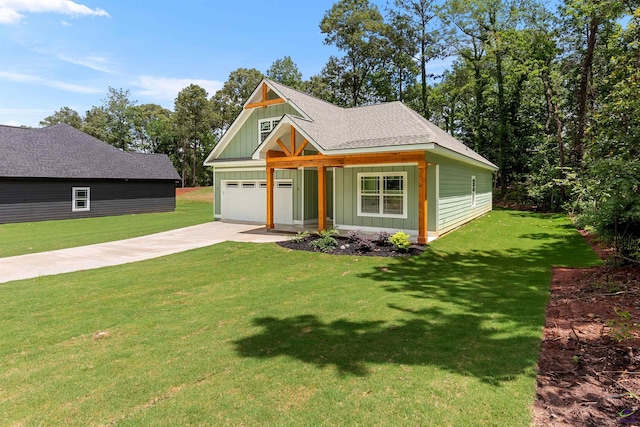 view of front of home featuring board and batten siding, driveway, a front lawn, and covered porch