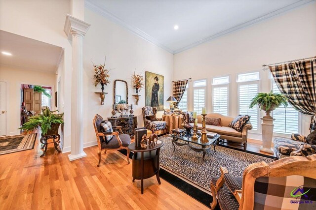 160 Barrington Hall Dr, Macon, GA 31220 - living room featuring recessed lighting, light wood-style flooring, ornate columns, and crown molding
