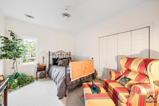 160 Barrington Hall Dr, Macon, GA 31220 - bedroom with visible vents, a closet, ornamental molding, and carpet floors