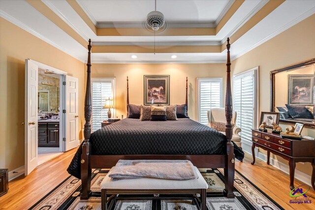 160 Barrington Hall Dr, Macon, GA 31220 - bedroom with a tray ceiling, multiple windows, and light wood-style floors