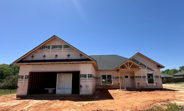 104 Reedy Ct, Perry, GA 31069 - property under construction featuring a shingled roof and fence