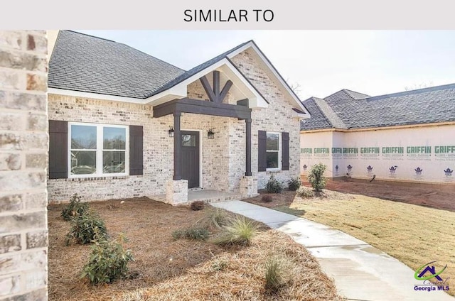 104 Reedy Ct, Perry, GA 31069 - view of front of property featuring brick siding and a shingled roof
