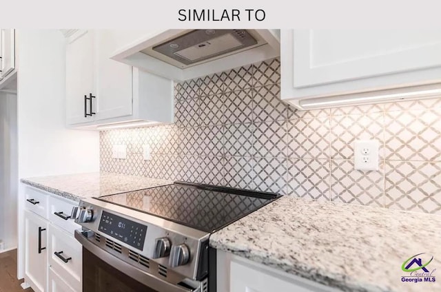 104 Reedy Ct, Perry, GA 31069 - kitchen featuring electric stove, custom range hood, tasteful backsplash, and white cabinetry