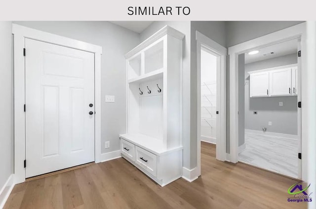 104 Reedy Ct, Perry, GA 31069 - mudroom featuring baseboards and light wood finished floors