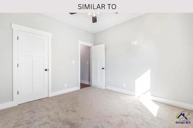 104 Reedy Ct, Perry, GA 31069 - unfurnished bedroom featuring carpet floors, baseboards, and ceiling fan