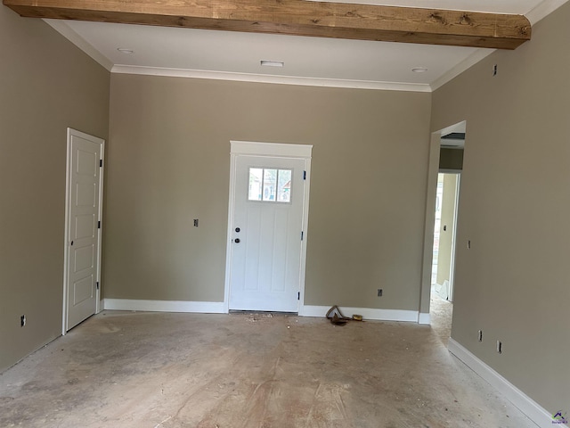 foyer entrance featuring beamed ceiling, crown molding, and baseboards