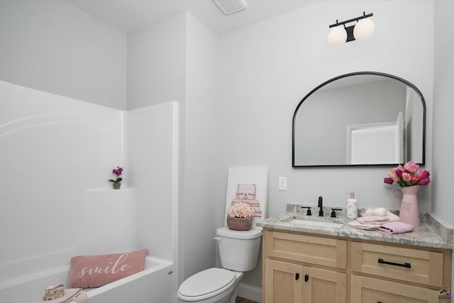 bathroom featuring toilet, vanity, shower / washtub combination, and visible vents