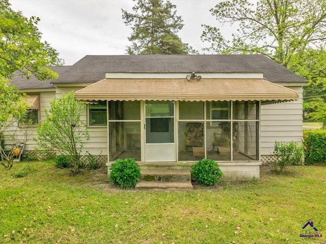 601 Travelers Rest Rd, Montezuma, GA 31063 - rear view of house featuring a lawn