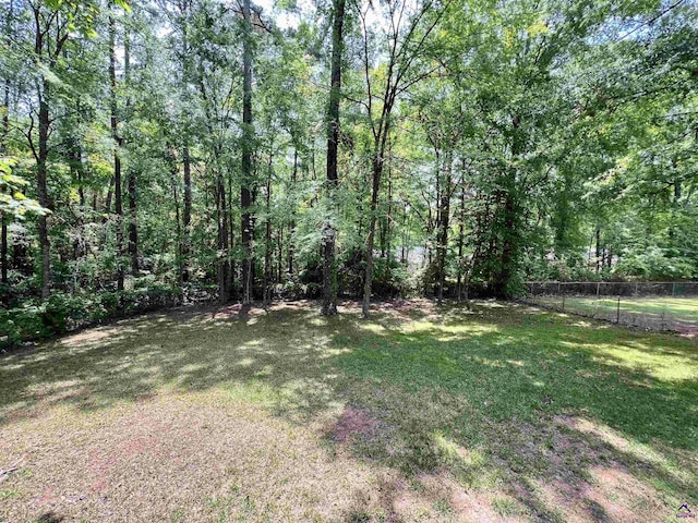 2045 Greentree Pkwy, Macon, GA 31220 - view of yard featuring a view of trees and fence