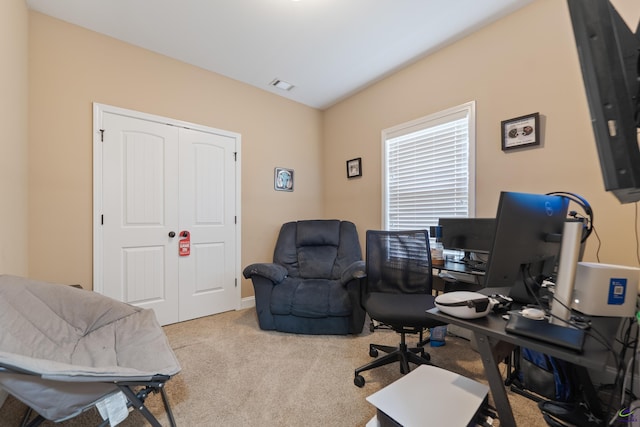 home office with carpet and visible vents