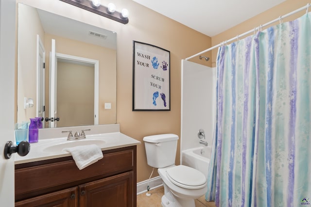 bathroom with toilet, vanity, shower / tub combo with curtain, baseboards, and visible vents