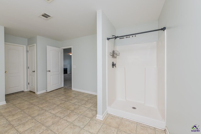 101 Bryce Dr, Warner Robins, GA 31088 - full bath featuring baseboards, visible vents, and walk in shower