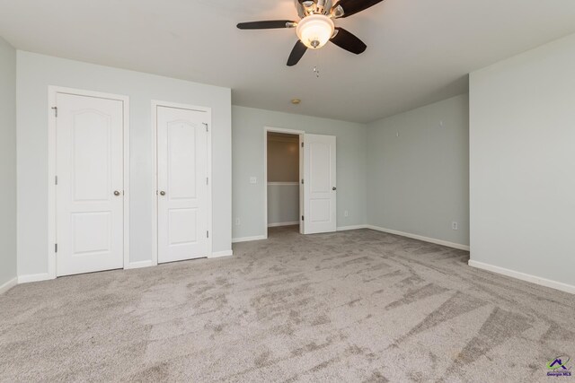 101 Bryce Dr, Warner Robins, GA 31088 - unfurnished bedroom with carpet, a ceiling fan, and baseboards