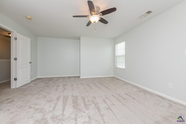 101 Bryce Dr, Warner Robins, GA 31088 - carpeted spare room with visible vents, a ceiling fan, and baseboards