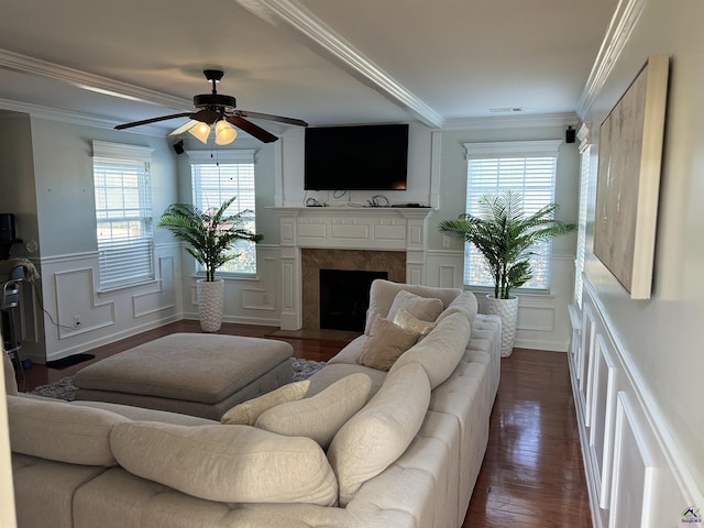 101 Bryce Dr, Warner Robins, GA 31088 - living room with ornamental molding, a ceiling fan, a decorative wall, and plenty of natural light