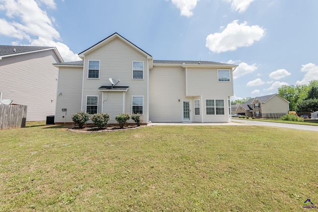 101 Bryce Dr, Warner Robins, GA 31088 - rear view of house featuring fence and a lawn