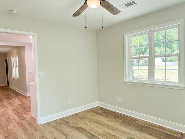 407 Frank Satterfield Rd, Perry, GA 31069 - empty room featuring baseboards, a ceiling fan, light wood-type flooring, and a smoke detector