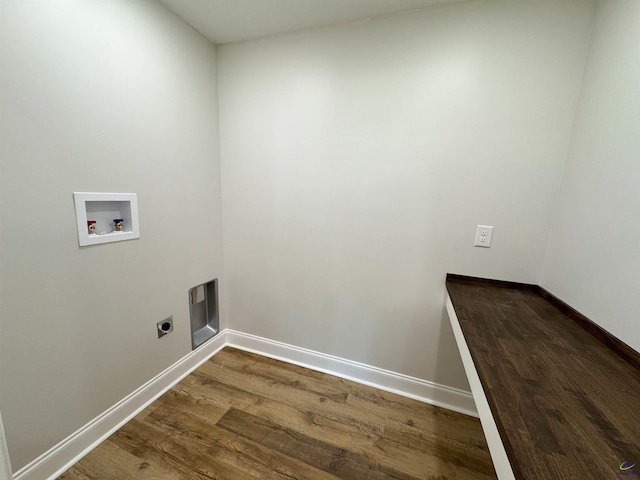 407 Frank Satterfield Rd, Perry, GA 31069 - washroom with dark wood-type flooring, hookup for a washing machine, and baseboards