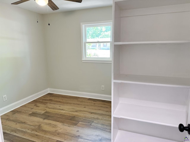 407 Frank Satterfield Rd, Perry, GA 31069 - unfurnished room featuring ceiling fan, wood finished floors, and baseboards