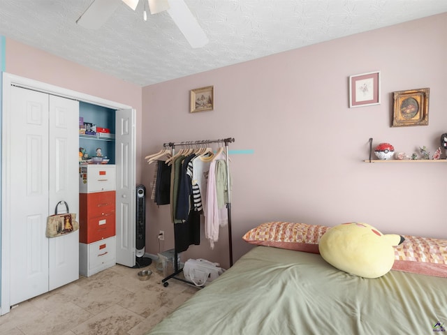 bedroom featuring a closet and ceiling fan
