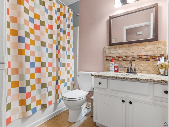 full bathroom featuring backsplash, toilet, and vanity