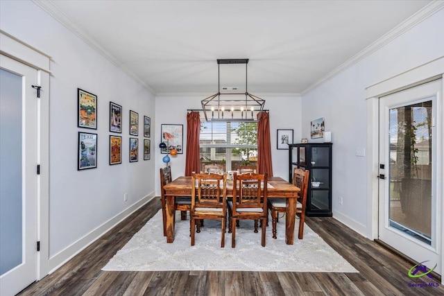 315 Apalachee Way, Bonaire, GA 31005 - dining space featuring ornamental molding, a notable chandelier, and dark wood-style floors