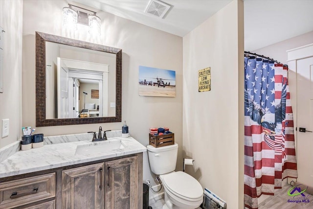 315 Apalachee Way, Bonaire, GA 31005 - full bath with toilet, a shower with curtain, visible vents, and vanity