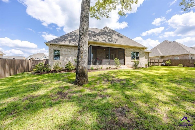 315 Apalachee Way, Bonaire, GA 31005 - back of property with a lawn, a shingled roof, and a fenced backyard