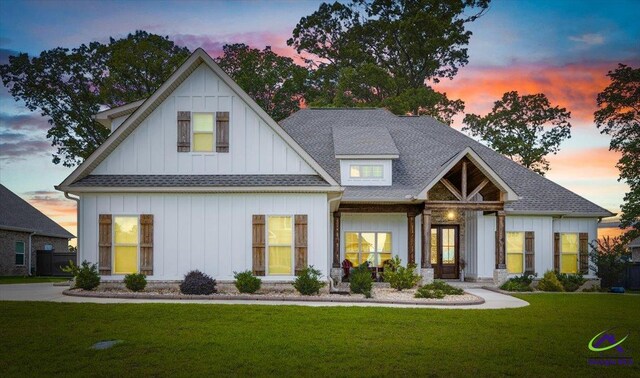 315 Apalachee Way, Bonaire, GA 31005 - modern farmhouse featuring a front lawn, french doors, board and batten siding, and roof with shingles