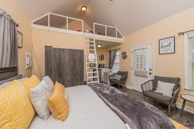 105 Taconic Ct, Bonaire, GA 31005 - bedroom featuring wood finished floors, vaulted ceiling, and baseboards