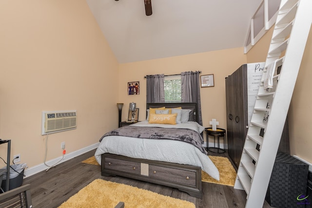 105 Taconic Ct, Bonaire, GA 31005 - bedroom with a wall unit AC, vaulted ceiling, wood finished floors, and baseboards
