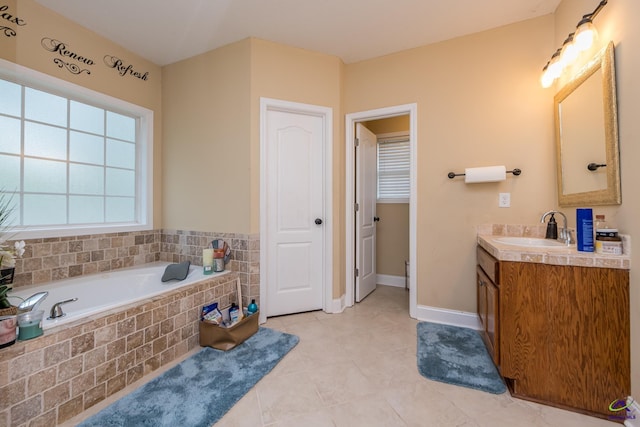 105 Taconic Ct, Bonaire, GA 31005 - full bath featuring tile patterned floors, a garden tub, vanity, and baseboards
