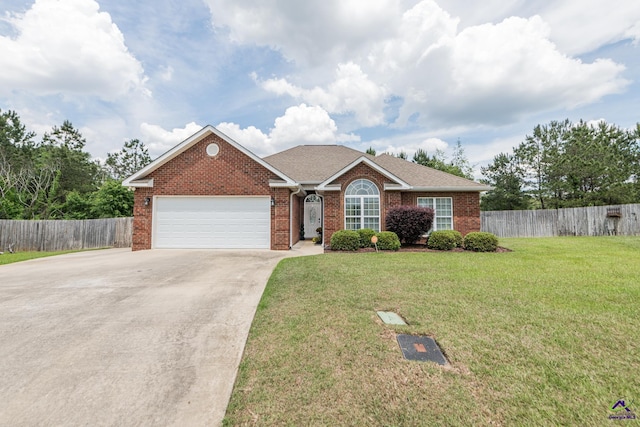 105 Taconic Ct, Bonaire, GA 31005 - ranch-style house featuring driveway, an attached garage, fence, brick siding, and a front lawn