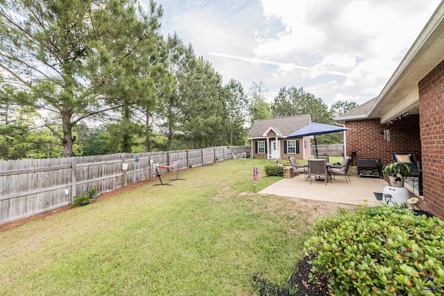 105 Taconic Ct, Bonaire, GA 31005 - view of yard featuring a fenced backyard and a patio area
