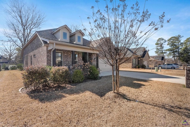 view of front of home with concrete driveway, a porch, and brick siding