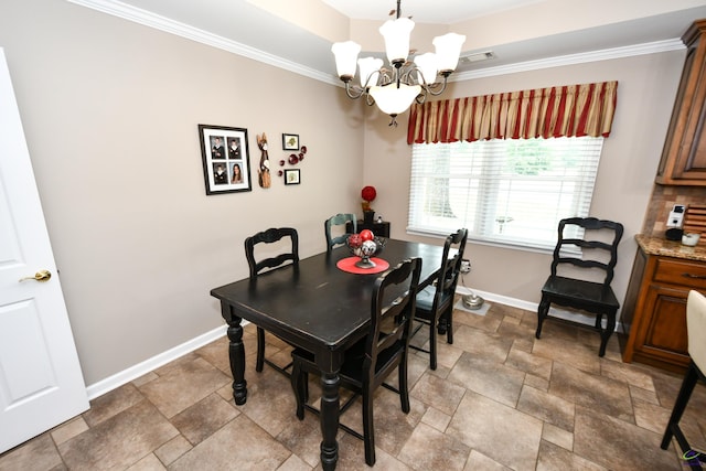 dining space featuring stone finish flooring, visible vents, crown molding, baseboards, and a chandelier