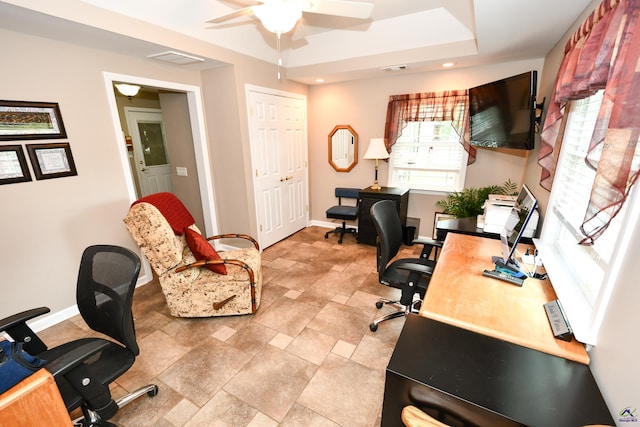 office space with visible vents, baseboards, ceiling fan, stone finish floor, and recessed lighting