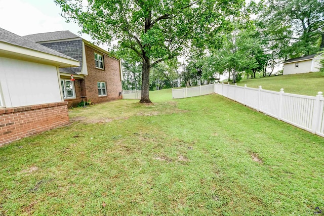 view of yard with fence