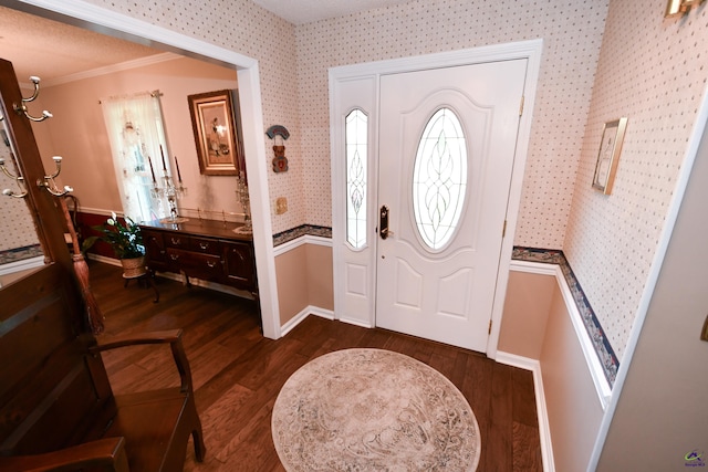 entryway featuring wallpapered walls and dark wood-style floors