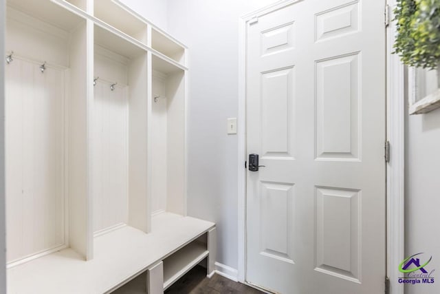 mudroom featuring dark wood-style flooring