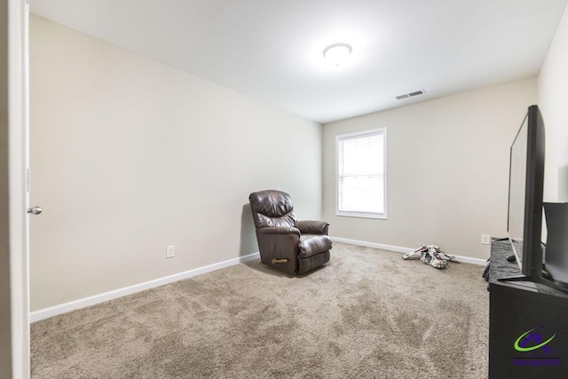 unfurnished room featuring carpet flooring, baseboards, and visible vents