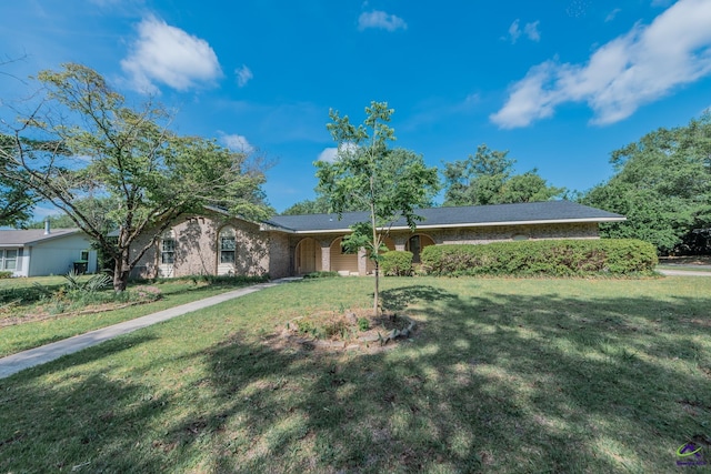 133 Avalon Dr, Warner Robins, GA 31093 - ranch-style house with a front lawn