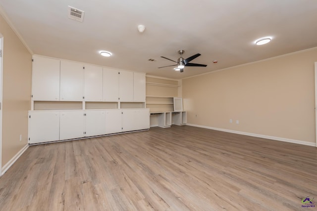 133 Avalon Dr, Warner Robins, GA 31093 - unfurnished living room with a ceiling fan, baseboards, visible vents, and ornamental molding
