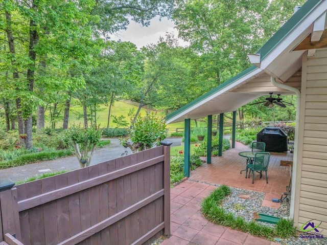 124 Joy Dr, Warner Robins, GA 31088 - view of patio / terrace with grilling area, fence, and a ceiling fan