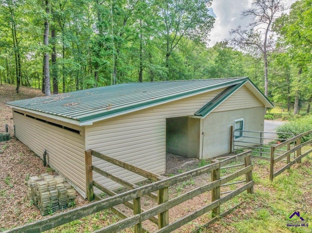 124 Joy Dr, Warner Robins, GA 31088 - view of outbuilding featuring fence, an outbuilding, and a wooded view