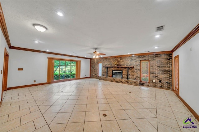 124 Joy Dr, Warner Robins, GA 31088 - unfurnished living room with ceiling fan, visible vents, crown molding, a fireplace, and baseboards