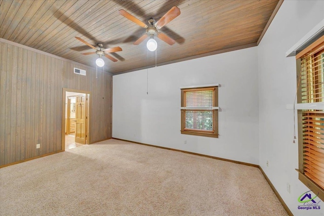 124 Joy Dr, Warner Robins, GA 31088 - empty room with carpet flooring, a ceiling fan, baseboards, wooden ceiling, and visible vents