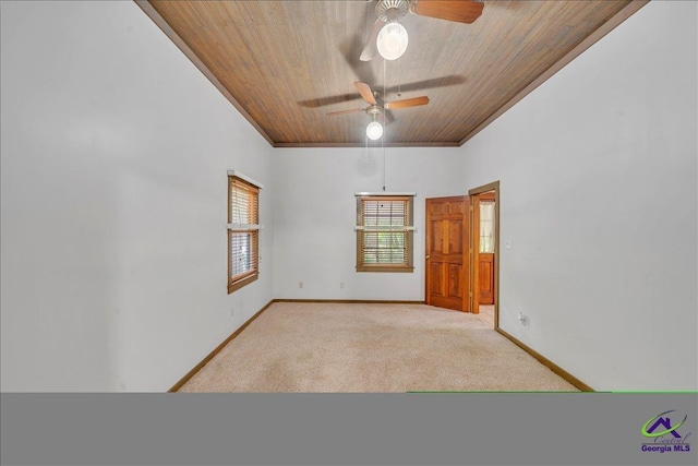124 Joy Dr, Warner Robins, GA 31088 - carpeted empty room featuring crown molding, a ceiling fan, wood ceiling, and baseboards